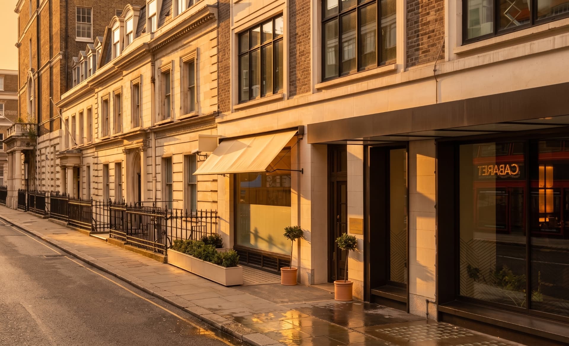 Street view of the Harley Building on New Cavendish Street, London, at golden hour